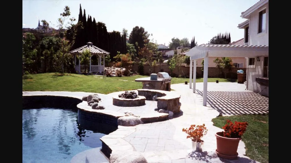 Custom lawn mowing service with custom design in Hutto, TX by Dream Pools and Spas