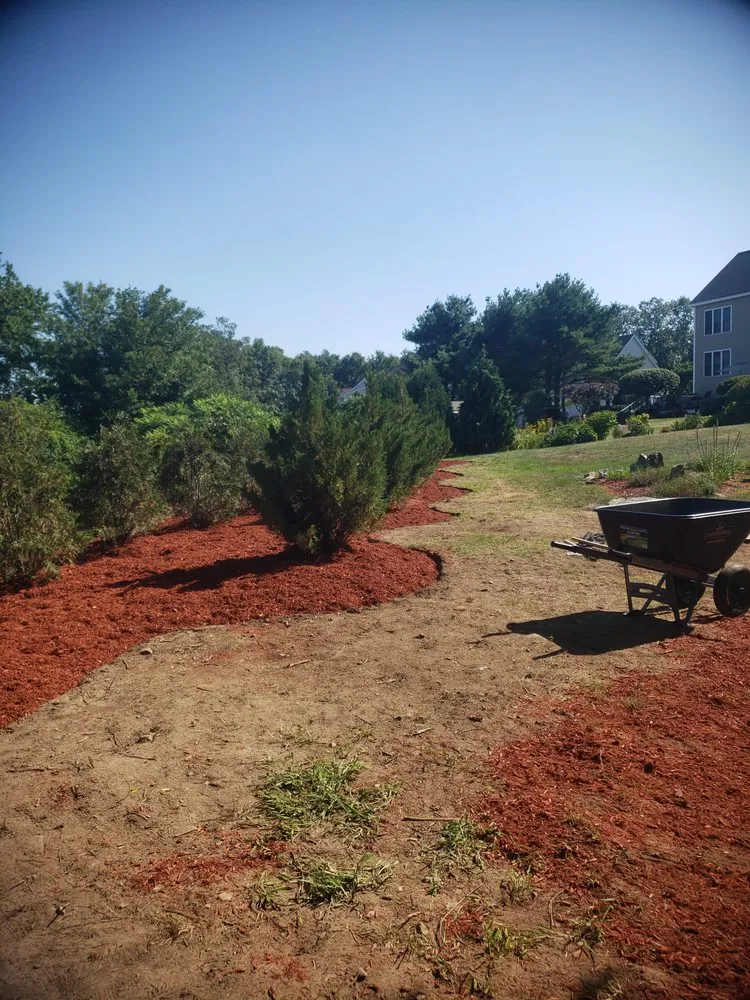 Expert landscaping services for homes in Raymond, NH by Dream Yards