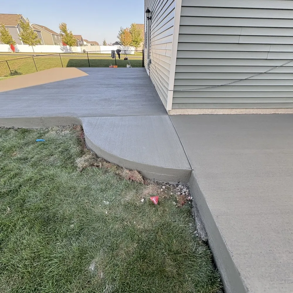 Custom landscape installation for homes in Shakopee, MN by Dreams Concrete