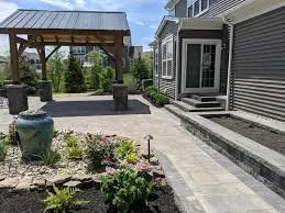 Custom lawn mowing service with custom design in Canton, OH by Dreamscape Contracting