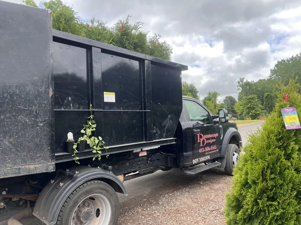 Custom lawn mowing service with custom design across Springfield, MA - Dreamscape Designs Landscaping