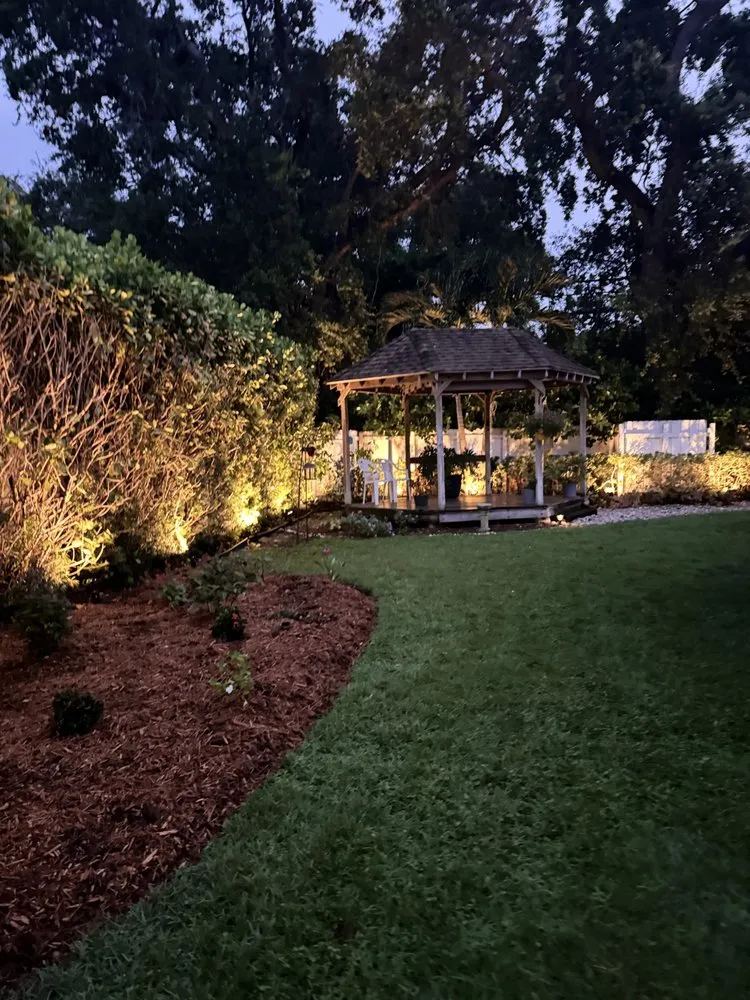 Custom outdoor landscaping in Bay Harbor Islands, FL by Dreamscape Lighting Design Landscaping