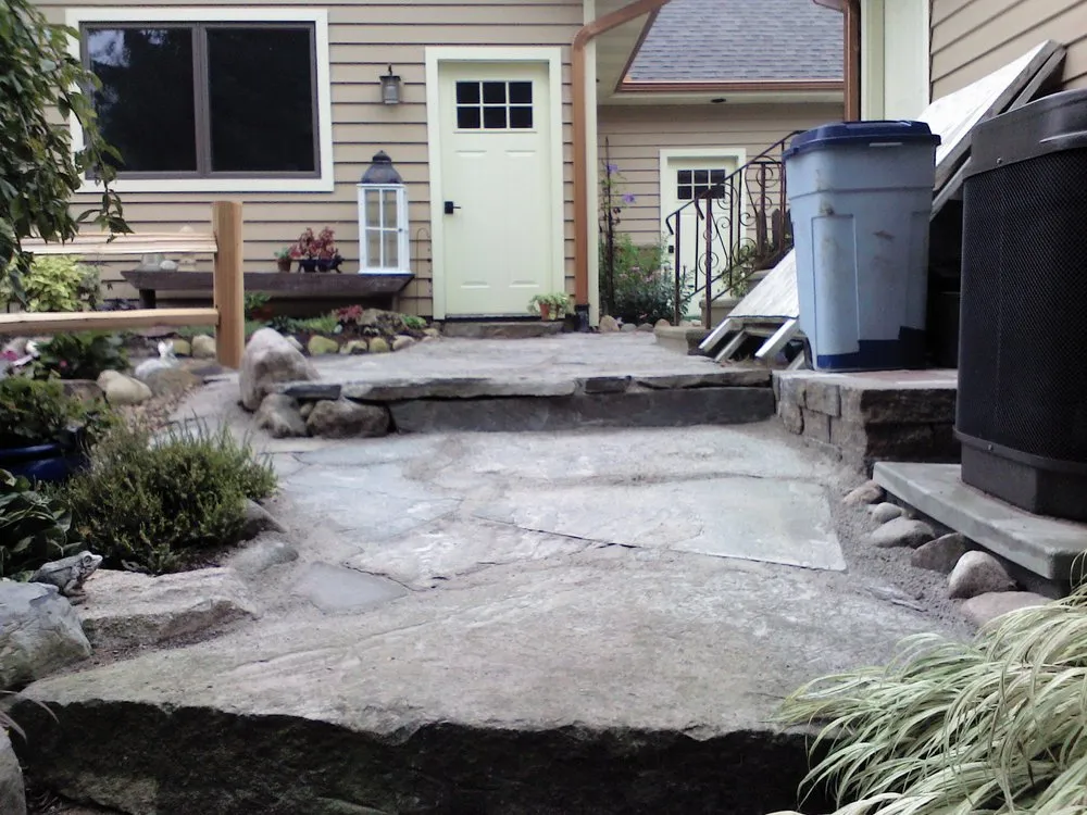 Expert outdoor landscaping for homes in Sherwood, MI by Dreamscape