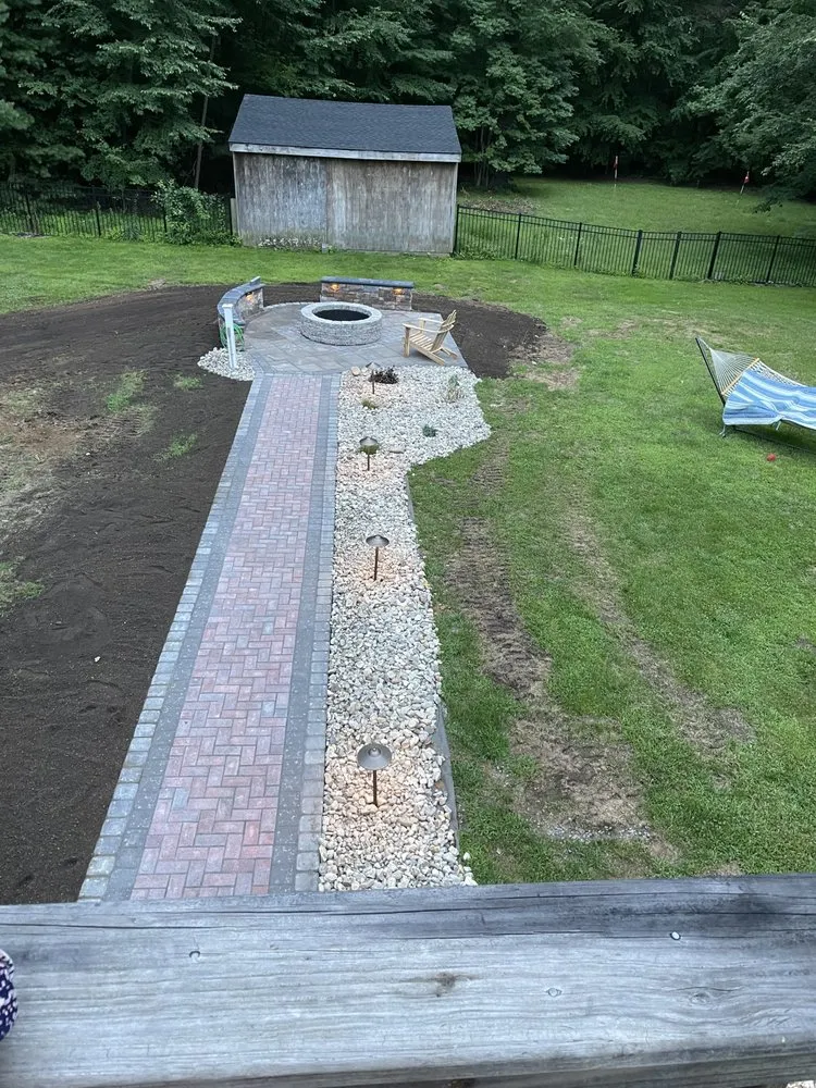 Custom yard maintenance for residential properties across Amston, CT - Dreamscapes