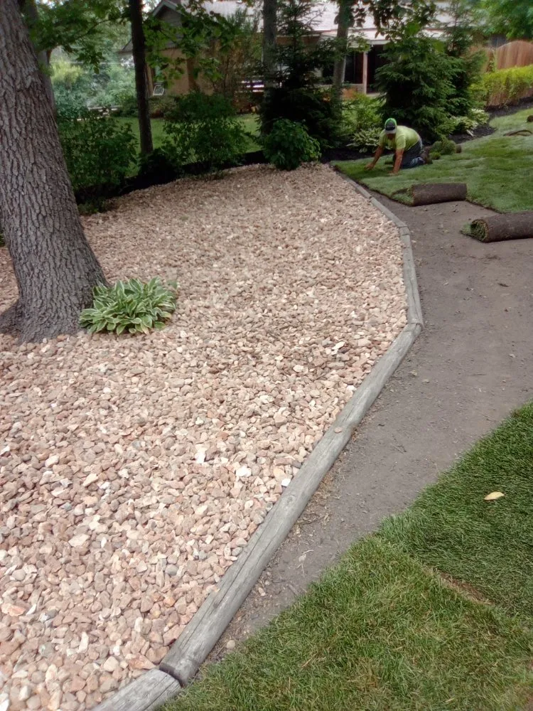 Affordable residential landscaping in Lemont, IL by Dreamscaping Yard Maintenace & Drainage
