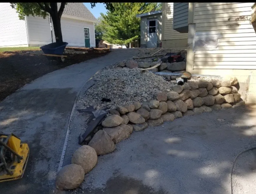 Professional yard cleanup service with custom design across Fruitport Charter Township, MI - Drew's Customs Cutz & Landscaping