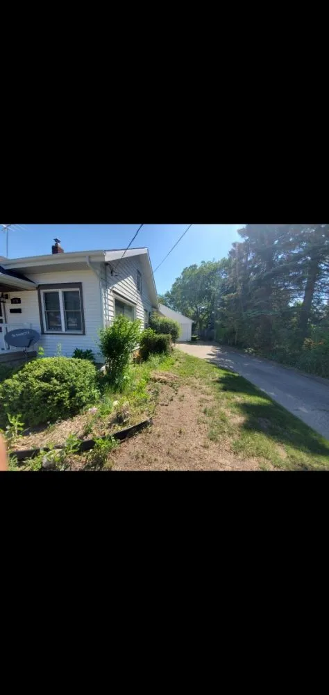 Professional lawn mowing service for beautiful yards in Fruitport Charter Township, MI by Drew's Customs Cutz & Landscaping