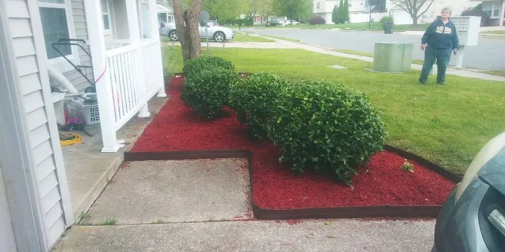 Local residential landscaping with custom design in Marydel, DE by Drew's Cutting Crew