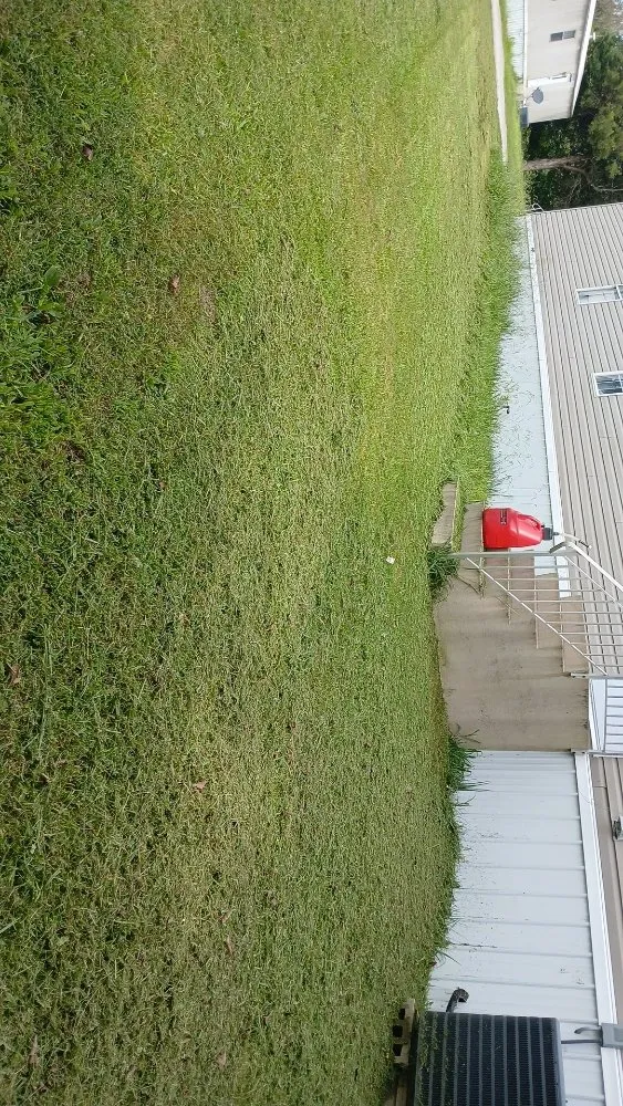 Custom lawn mowing service for homes in Greenville, KY by Drippin Diamond Lanwcare and Land Services