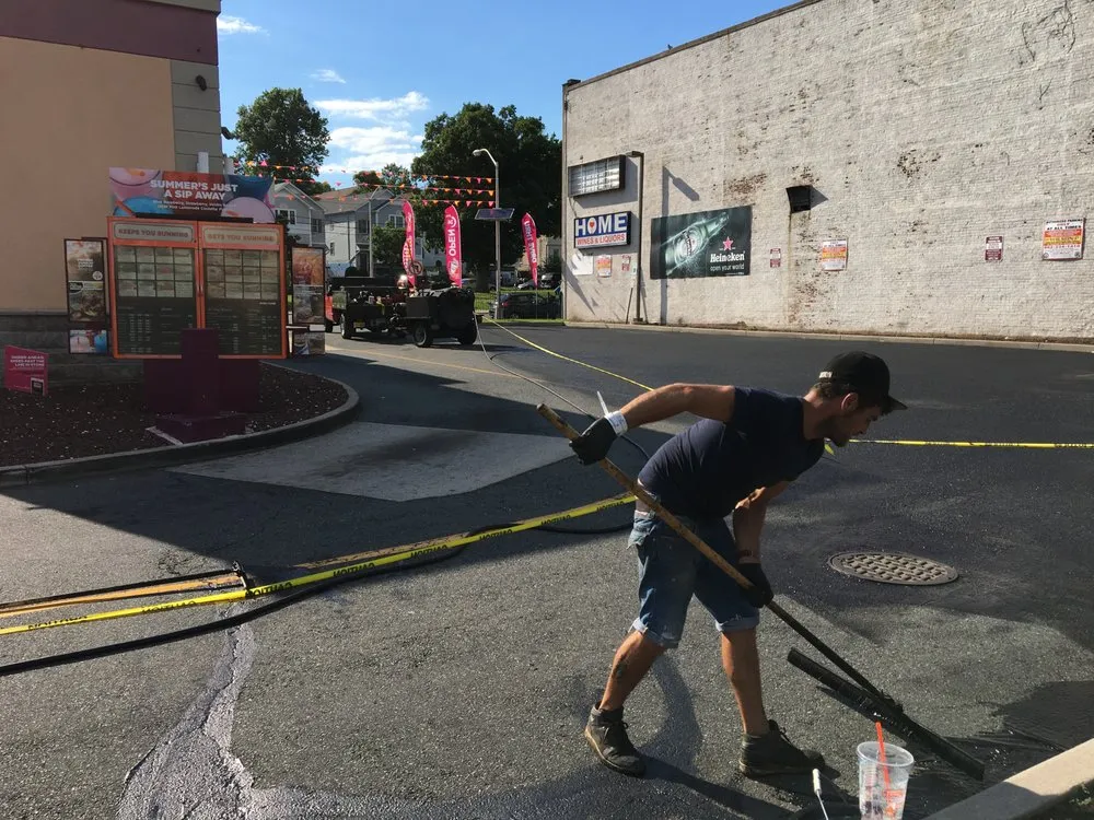 Custom lawn mowing service in Phillipsburg, NJ by Drive Paving And Sealcoating