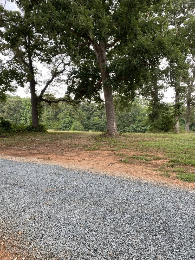 Professional landscape installation for residential properties across Monroe, NC - Driven Lawn and Tractor