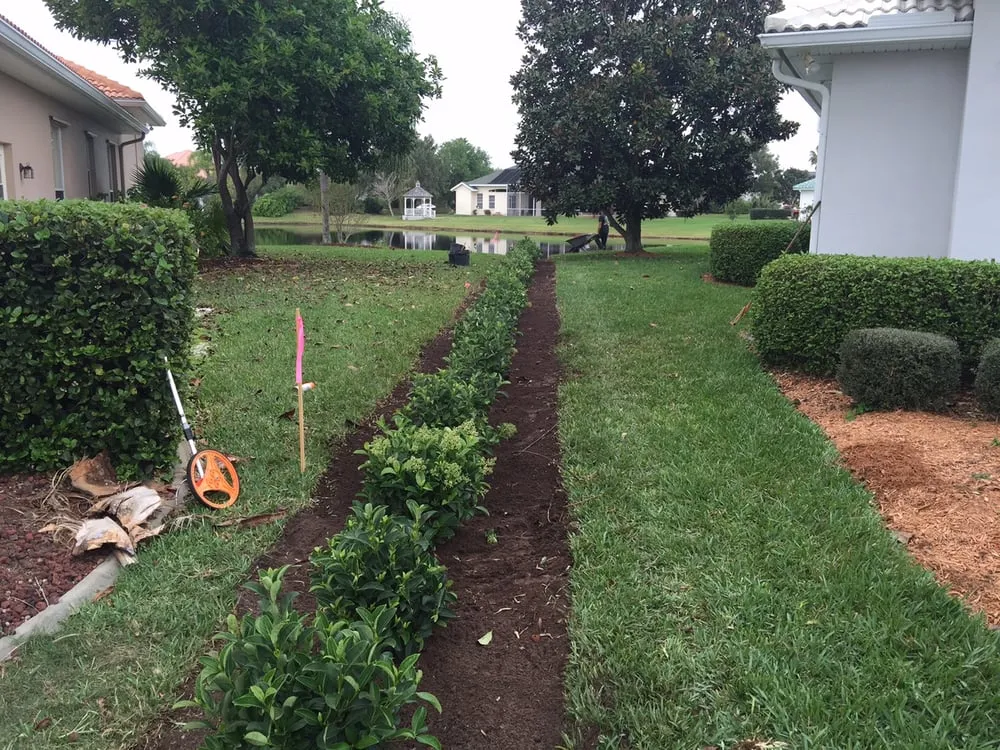 Affordable garden landscaping with custom design in Melbourne, FL by Druse Landscaping And Tree Services