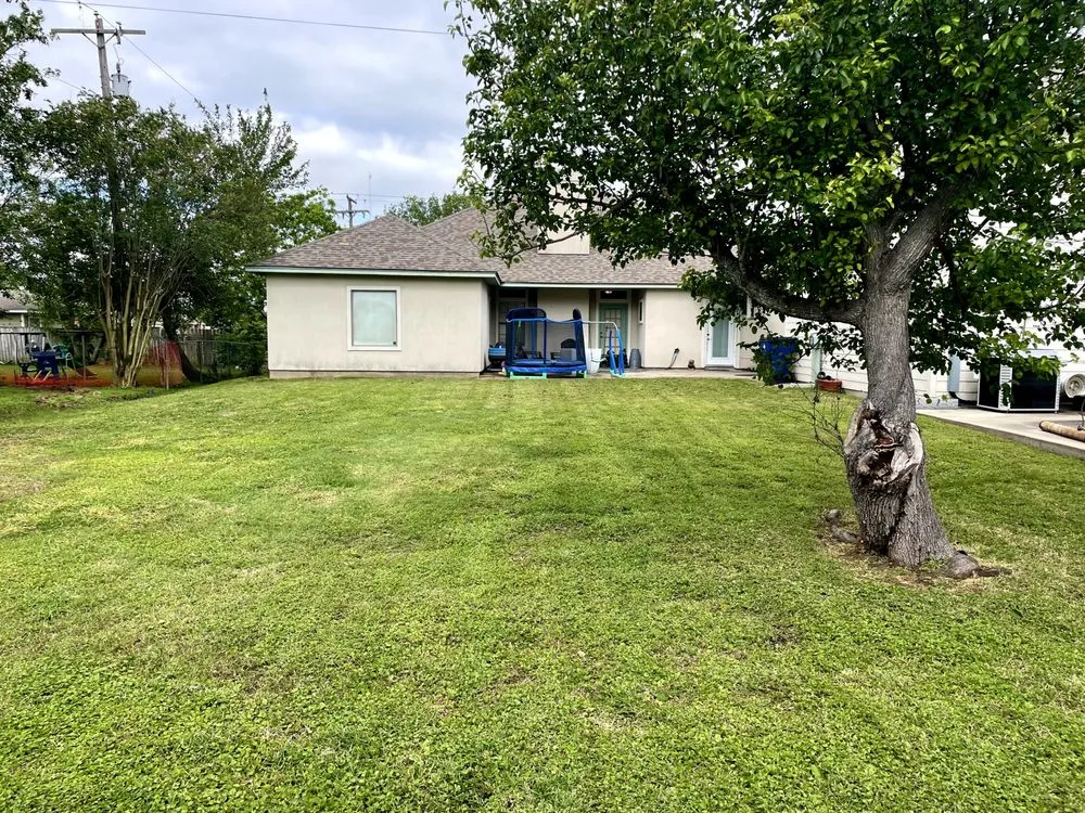 Custom outdoor landscaping for homes across Texas City, TX - D’s Lawn Services