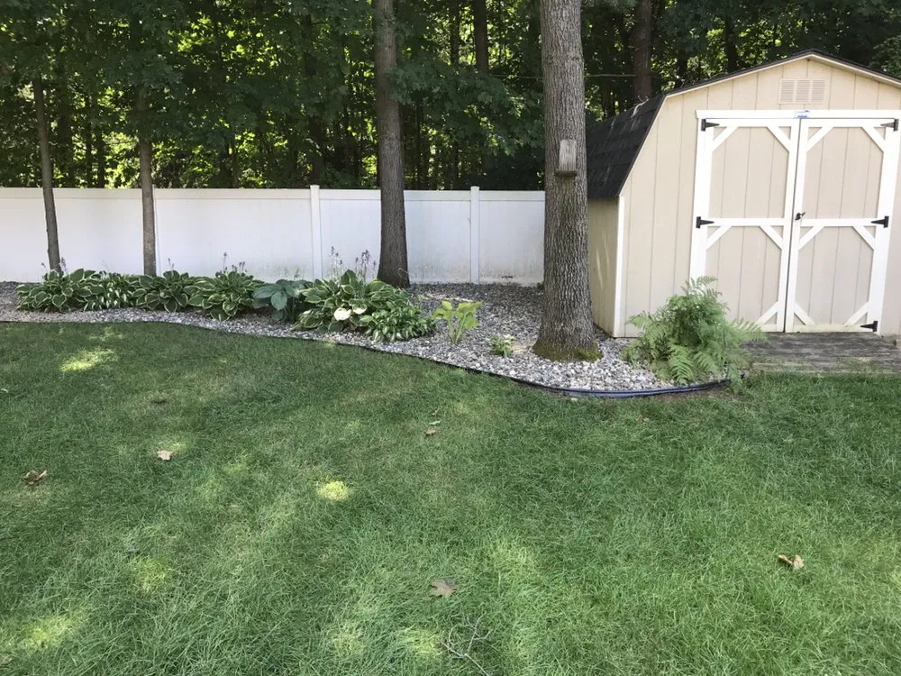 Custom landscape design for beautiful yards in Ballston Spa, NY by D's Lawncare