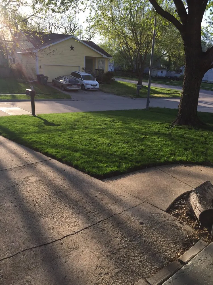 Expert landscape design for year-round maintenance in Grimes, IA by DSM Lawn and Field Mowing