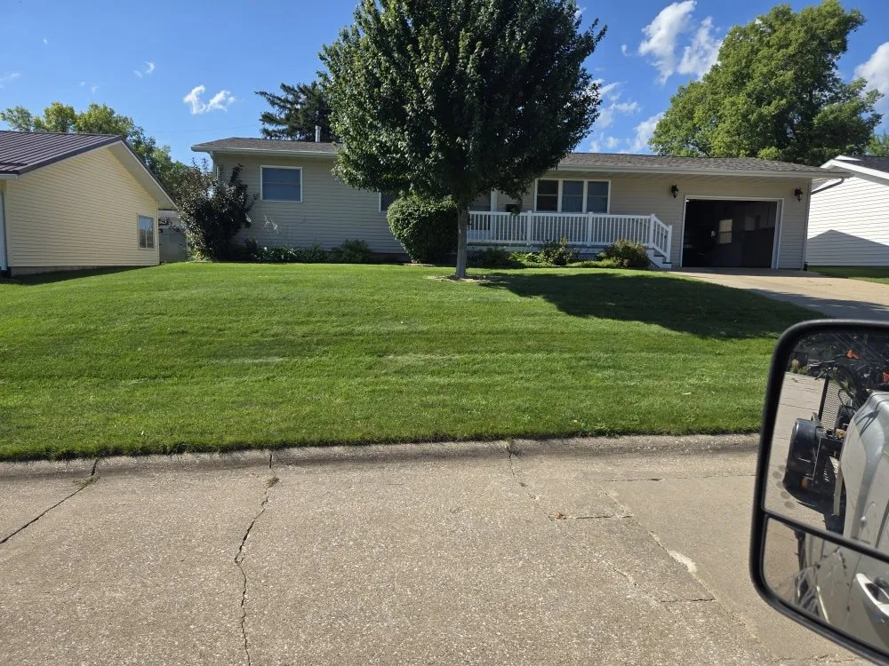 Custom yard maintenance for homes in Tama, IA by D&T Lawn Services & More