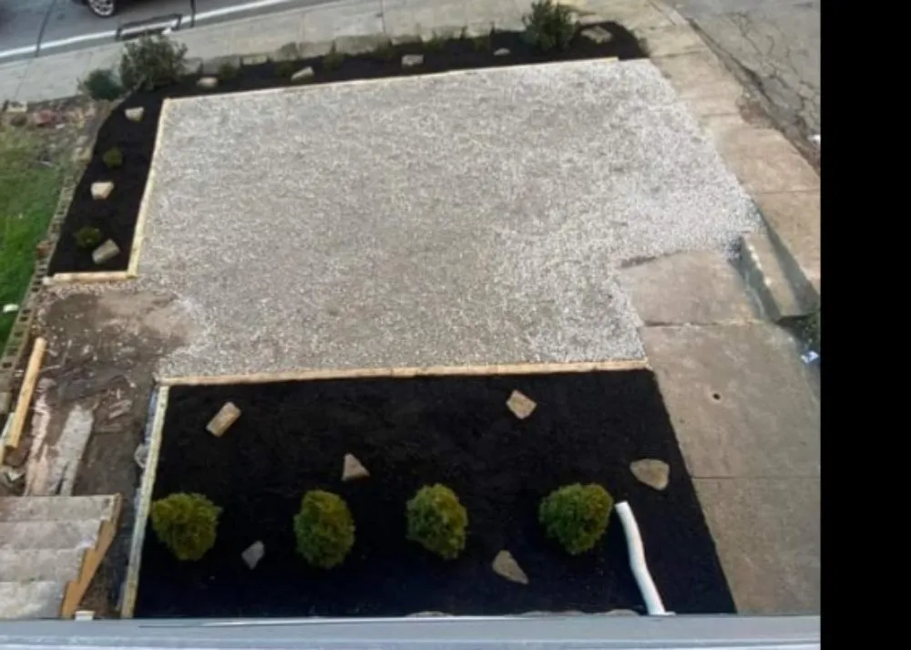 Affordable outdoor landscaping for homes in Brownsville, PA by Dub town Mows