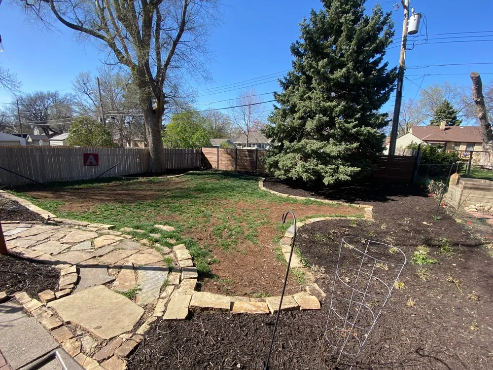 Custom landscape installation in Lincoln, NE by Dudley's Dew-Right Tree & Mulch