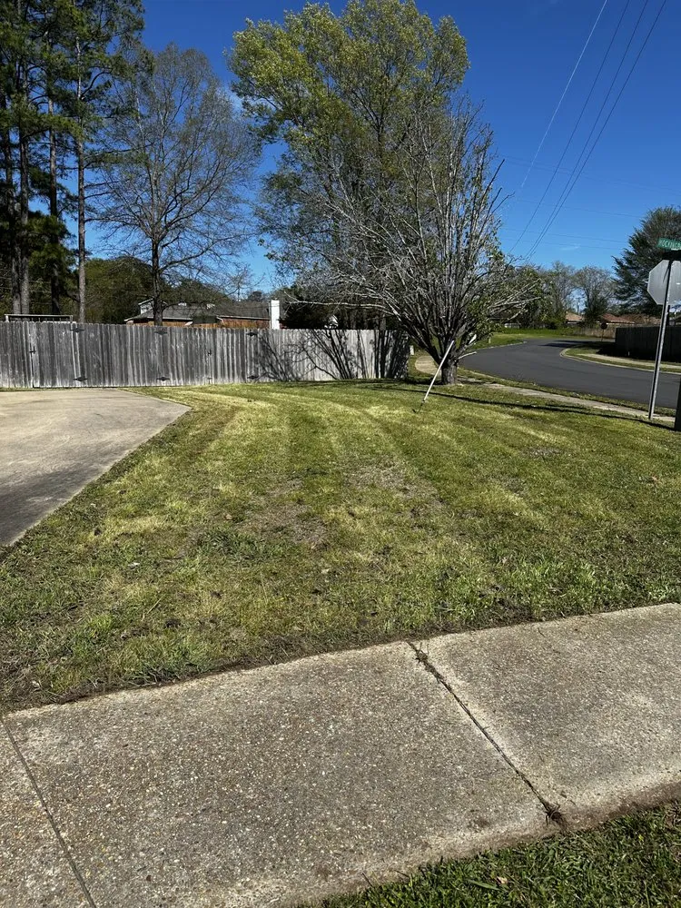 Professional yard maintenance for residential properties in Brandon, MS by Dukes Landscaping
