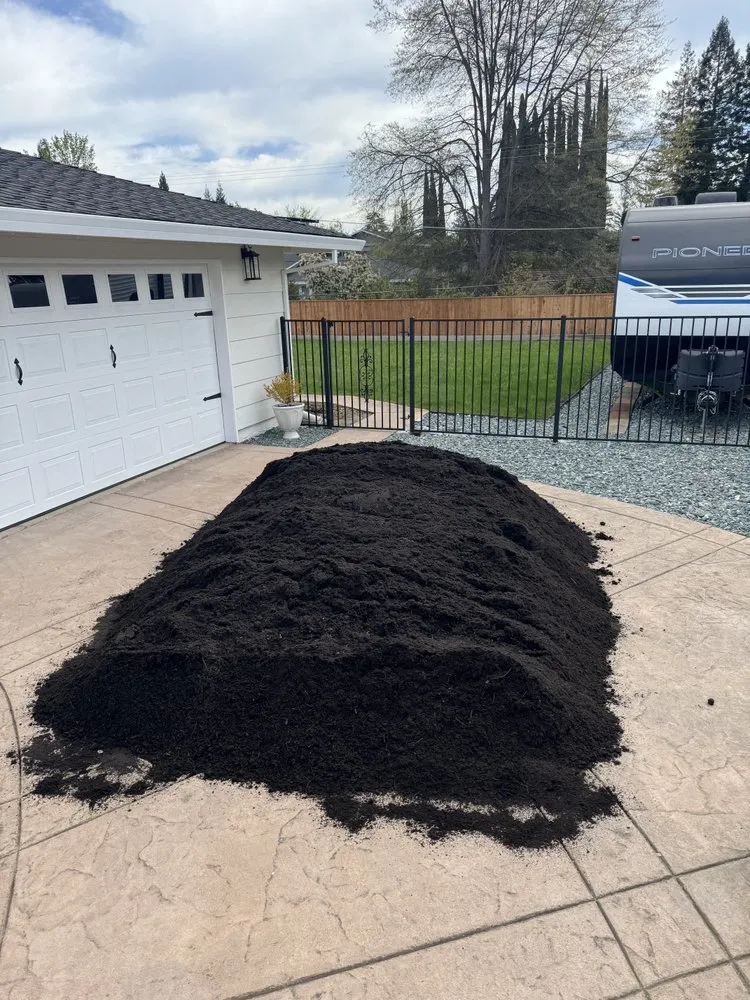 Custom outdoor landscaping with custom design in Rancho Cordova, CA by Dump Truck 916