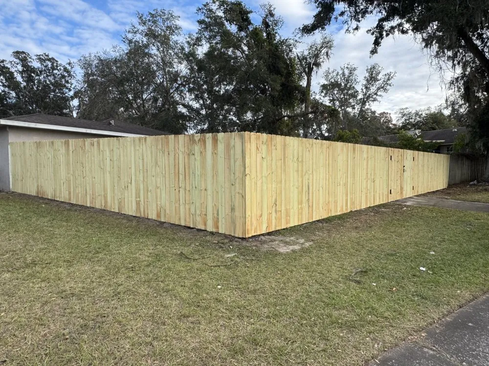Local yard cleanup service for year-round maintenance across Tampa, FL - Dun Rite Fencing