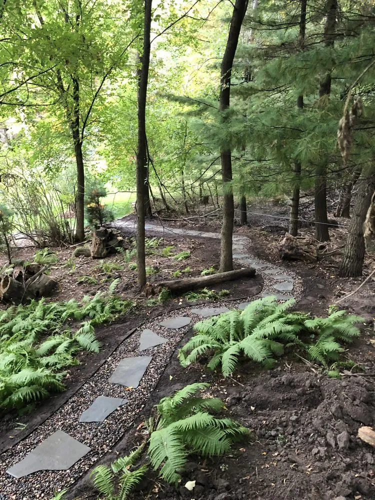 Expert lawn mowing service for residential properties in Burnsville, MN by Dunbar Landscaping