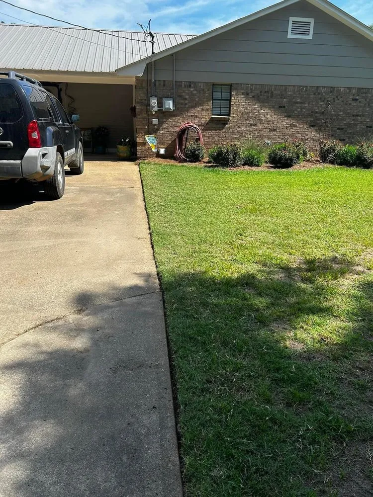 Custom lawn mowing service with custom design in Winona, MS by Dungan’s Lawn Care
