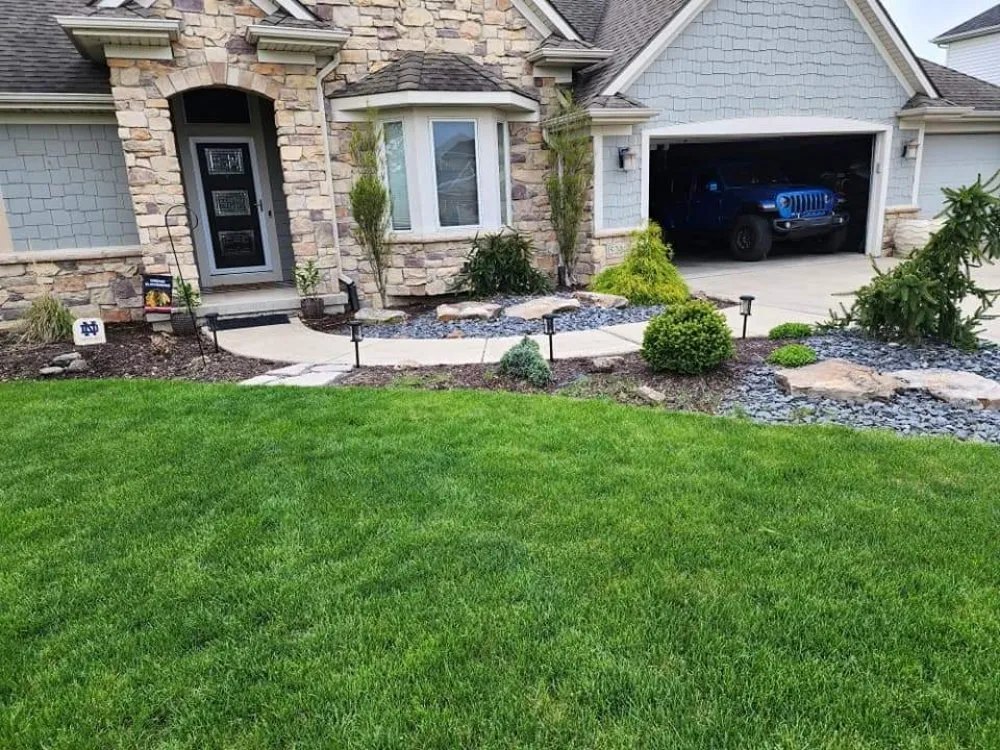 Expert residential landscaping for homes in Woodburn, IN by Dunham Home & Lawn