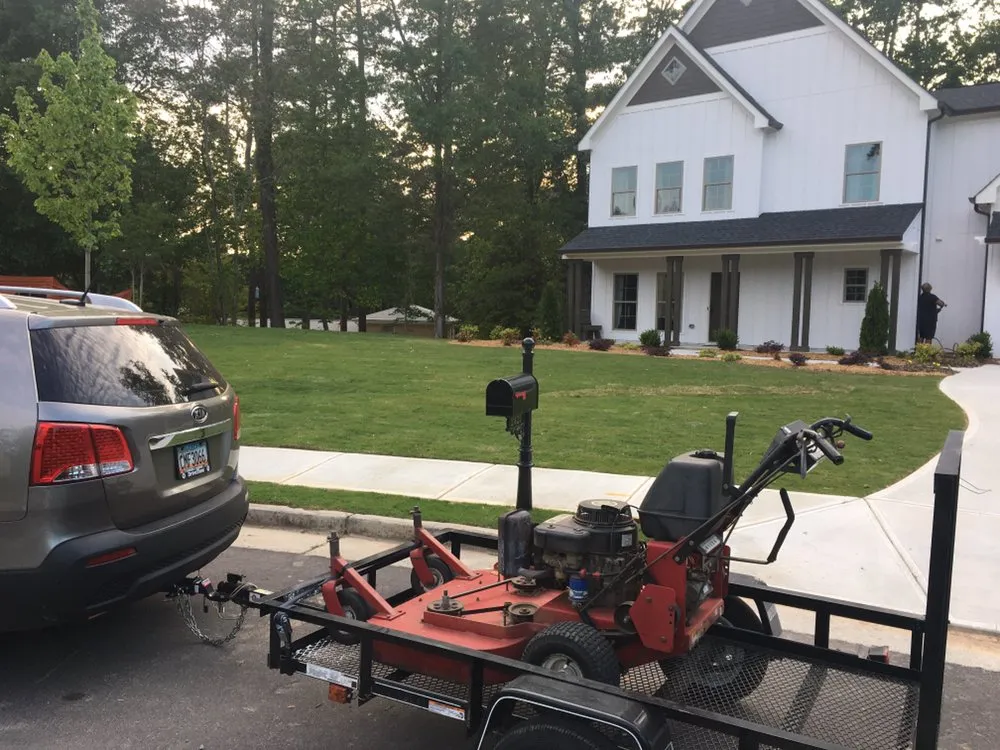 Affordable lawn care service for homes in Austell, GA by Dunn On Time