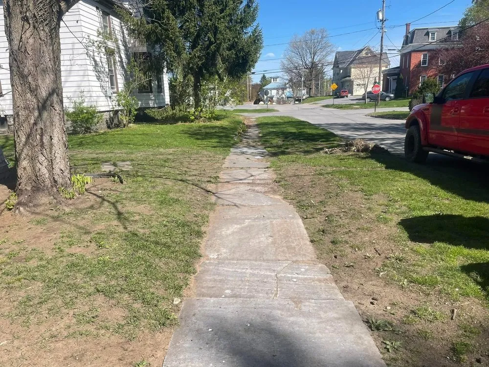 Affordable lawn mowing service for residential properties across Ogdensburg, NY - Duprey Construction