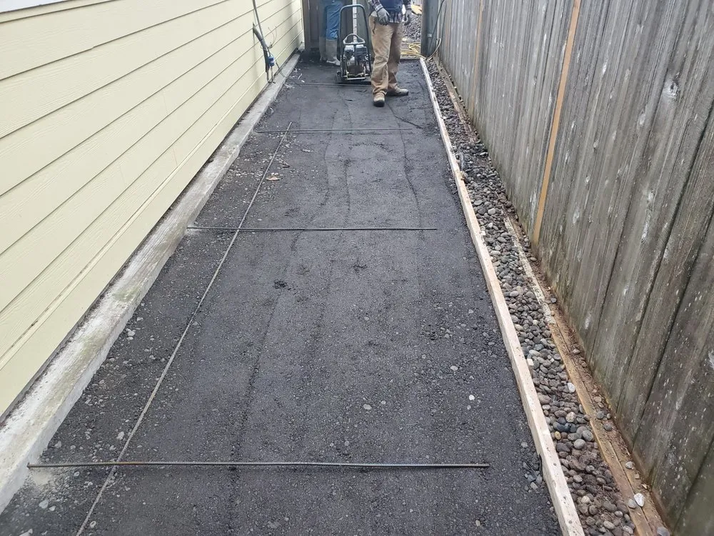 Custom outdoor landscaping for year-round maintenance in Lacey, WA by Dustin Concrete
