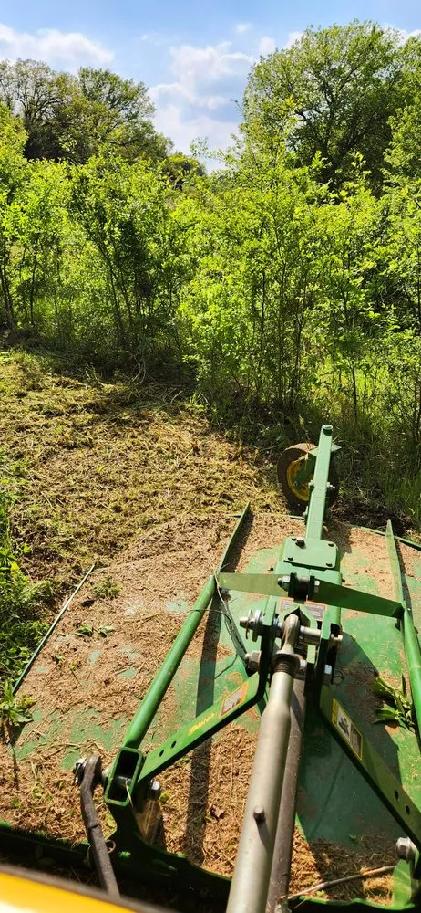 Custom lawn mowing service for beautiful yards across Savoy, TX - Dusty Boots Land Services