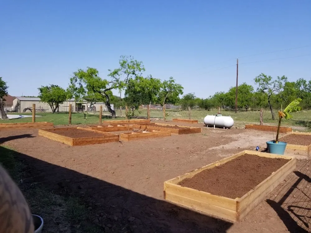Affordable outdoor landscaping with custom design in Victoria, TX by Dusty Truck Landscaping