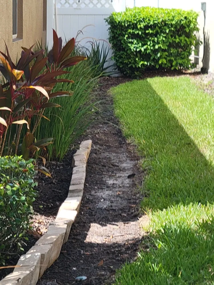 Professional yard maintenance for beautiful yards in Jacksonville, FL by Duval Landscape Maintenance