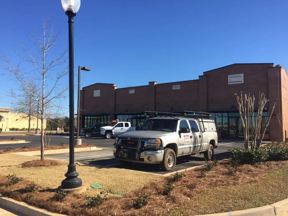 Custom lawn mowing service for residential properties in Fairhope, AL by DYAS Construction Management