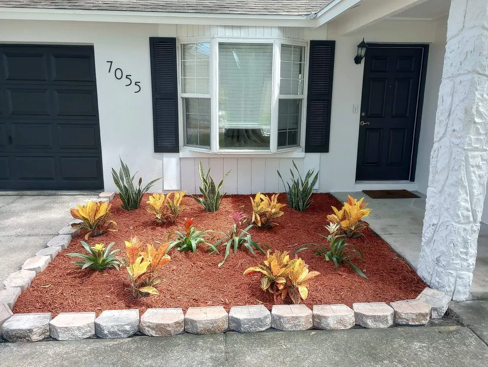 Custom outdoor landscaping for year-round maintenance across Port Richey, FL - Dykstra Lawn & Garden