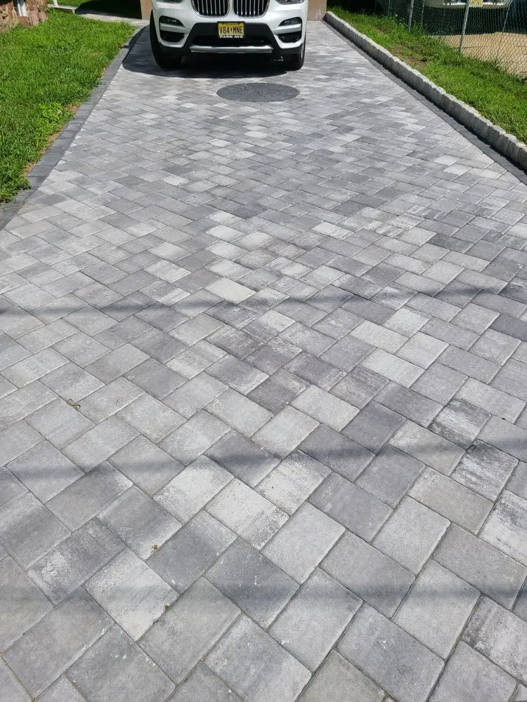 Expert landscape installation for outdoor upgrades in Englewood, NJ by Dylan. A Landscaping