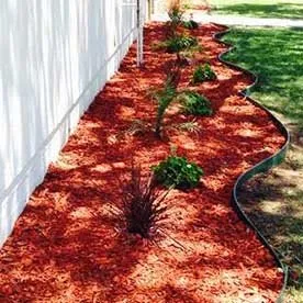 Custom outdoor landscaping with custom design in Cypress, CA by Dynamic Land and Tree Care