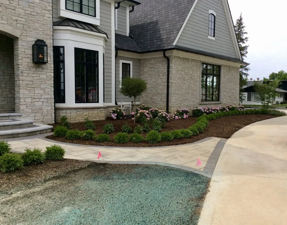 Local yard cleanup service for outdoor upgrades in Davisburg, MI by Dynamite Landscape