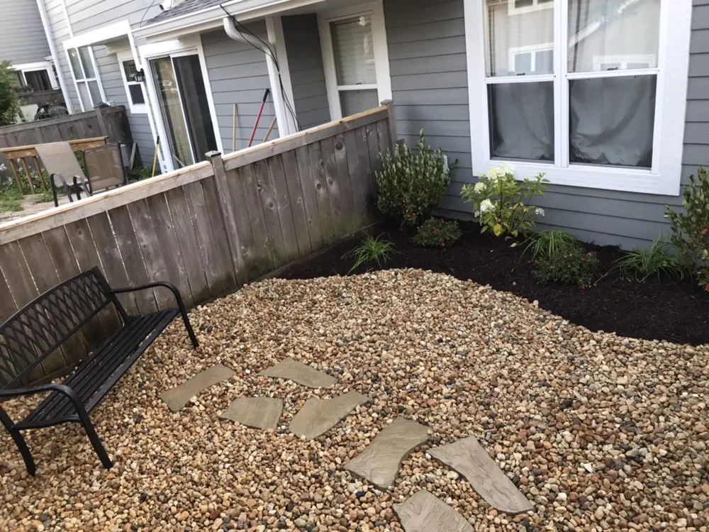 Local yard cleanup service for residential properties in Streamwood, IL by E & A Landscaping