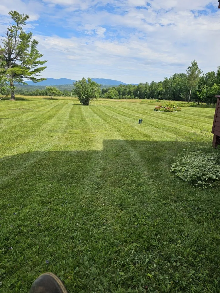 Custom lawn mowing service for homes in Rangeley, ME by E & J Property Maintenance