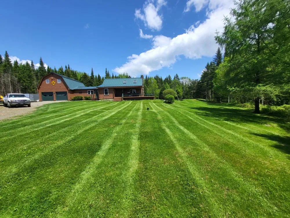 Affordable outdoor landscaping with custom design across Rangeley, ME - E & J Property Maintenance