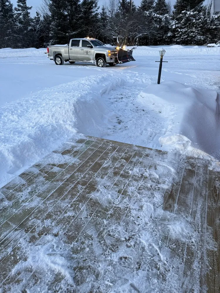 Custom lawn mowing service in Rangeley, ME by E & J Property Maintenance