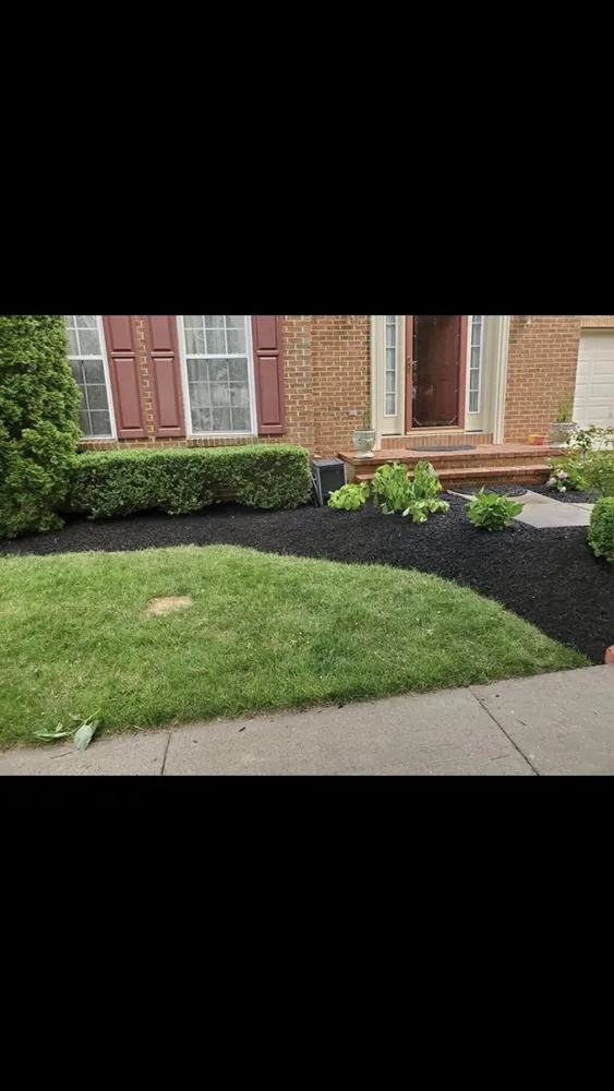 Professional lawn mowing service for year-round maintenance in Landover Hills, MD by E & L Landscaping