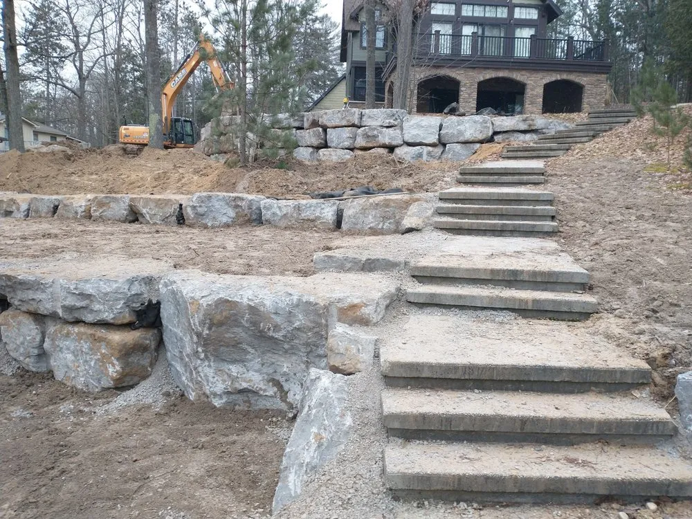 Professional landscape installation in Hillman, MI by E & M Property Improvements