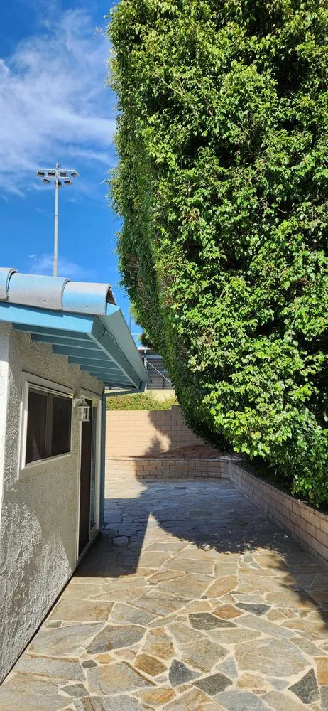 Custom outdoor landscaping for homes in Gardena, CA by E & M Tree Service