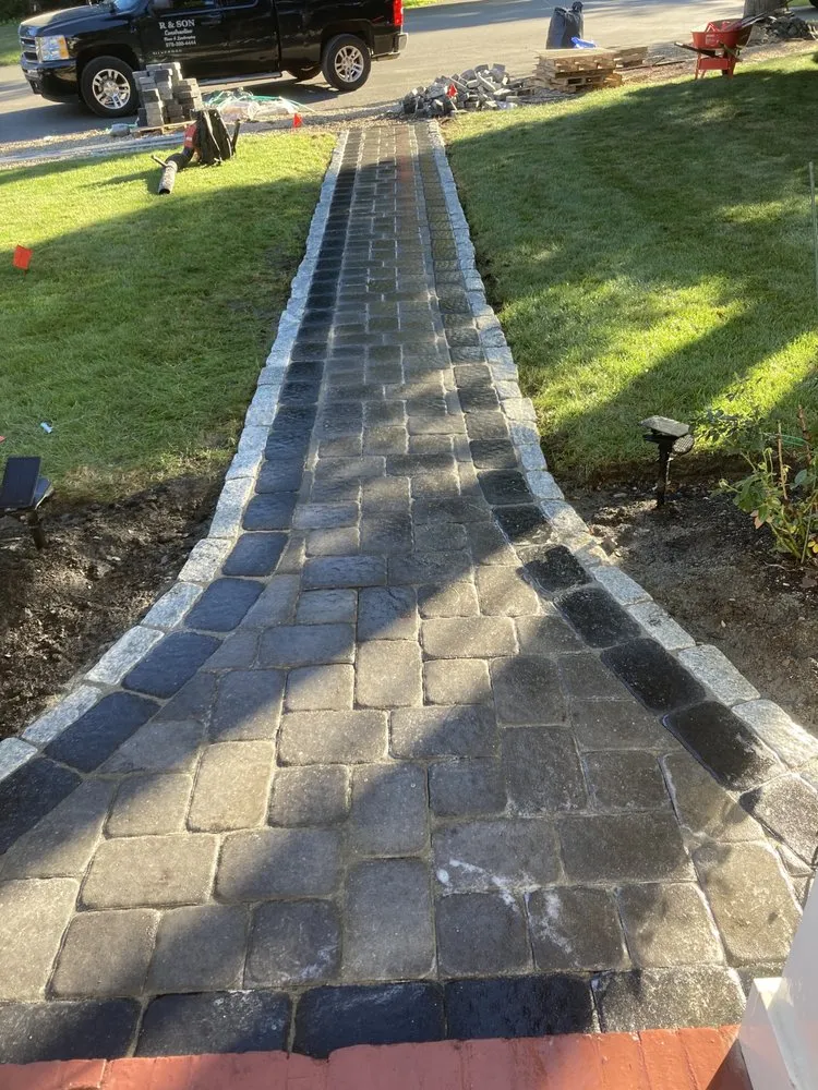 Affordable lawn mowing service for homes across Lynn, MA - E & Son