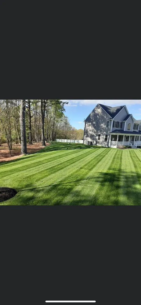 Custom outdoor landscaping for residential properties in Hudson, MA by E & V Landscaping Construction