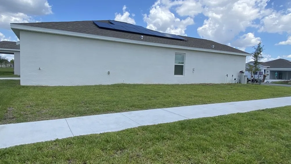 Expert lawn mowing service for residential properties across Davenport, FL - E & W Landscape And More