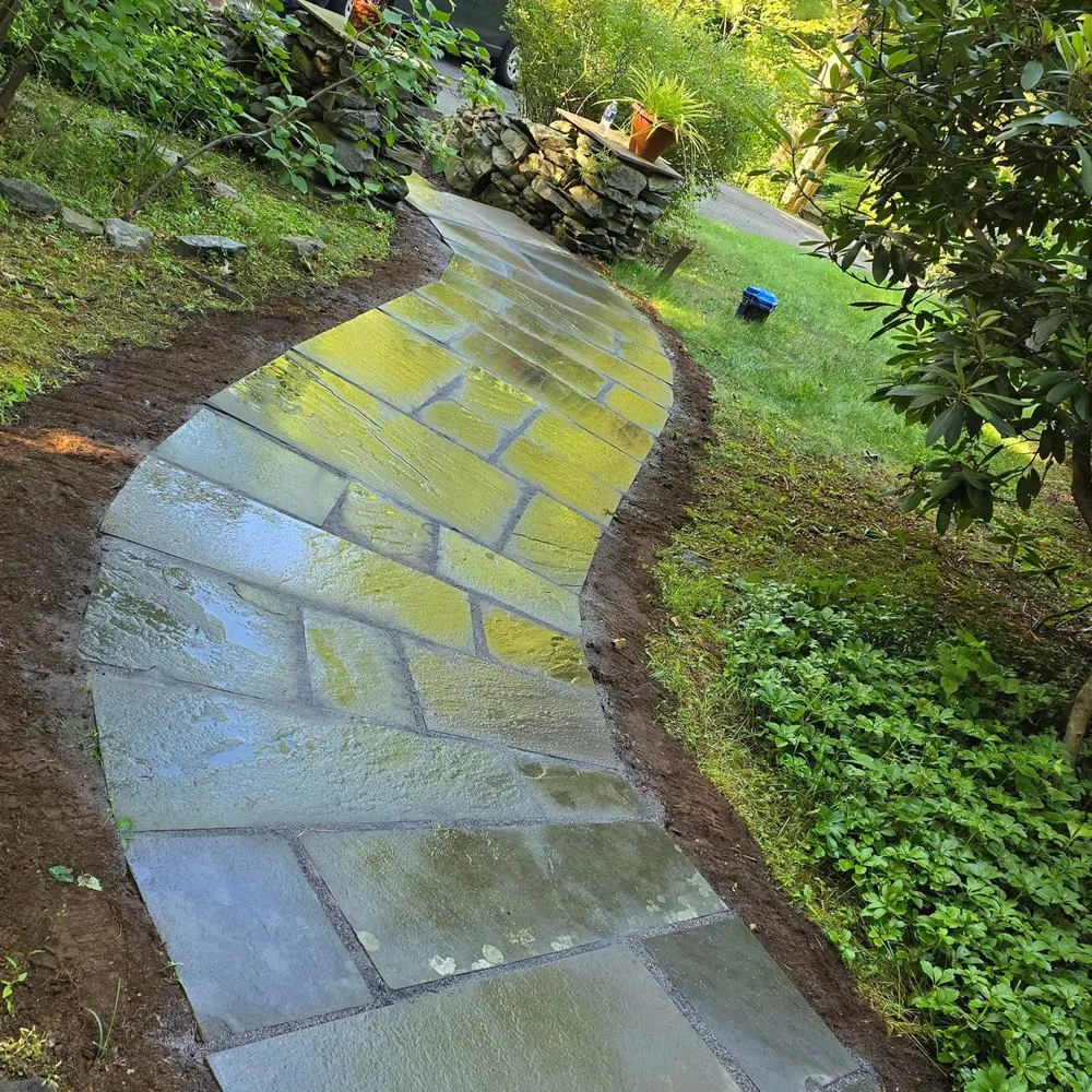 Custom lawn mowing service for residential properties across Danbury, CT - E C Landscaping